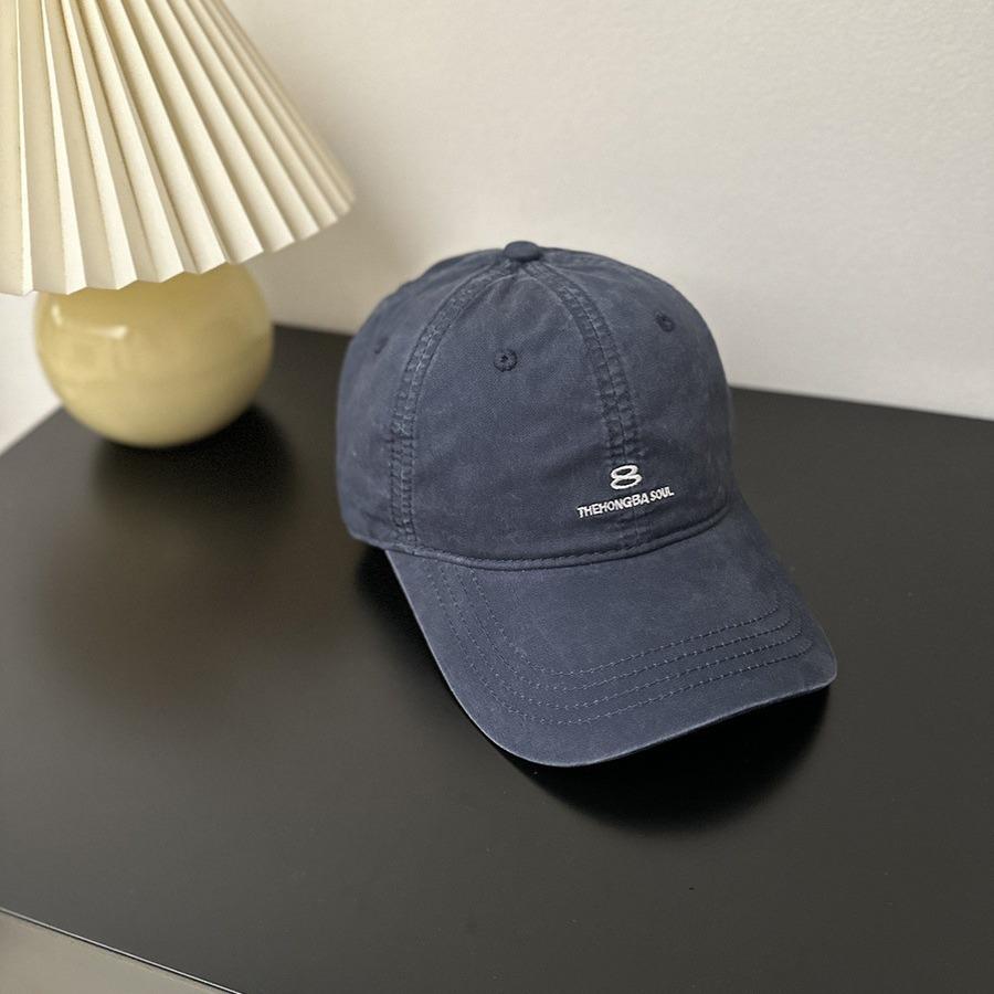 American street style embroidered baseball cap for women, designed for larger head sizes to create a slimming effect. features 