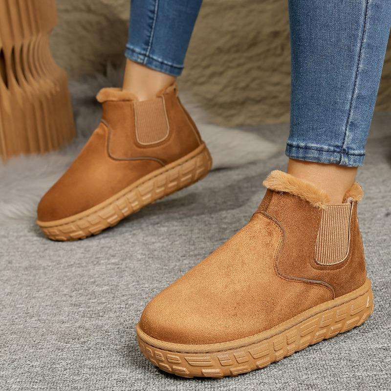 

New velvet cotton shoes keep warm and increase height, and women wear large-size snow boots with thick soles. 42