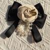 Modern Pearl Floral Pin With Butterfly Knot Design For Adult Formal Wear