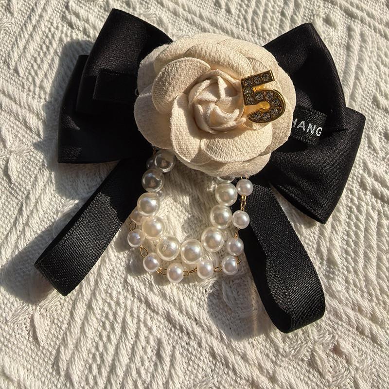 Modern Pearl Floral Pin With Butterfly Knot Design For Adult Formal Wear