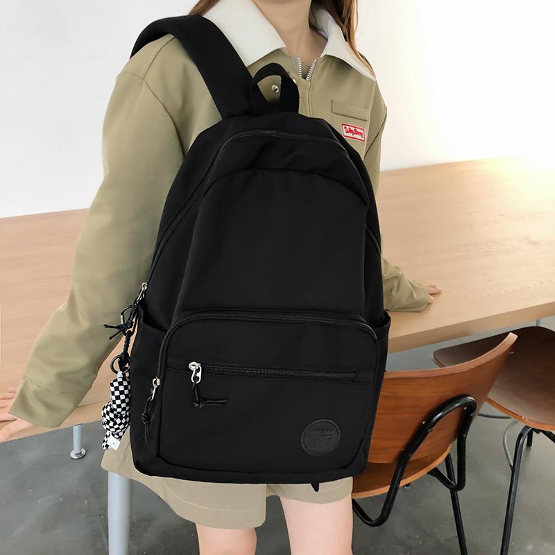 

Simple and versatile campus backpack female, solid color large-capacity high school student schoolbag casual computer backpack чорний