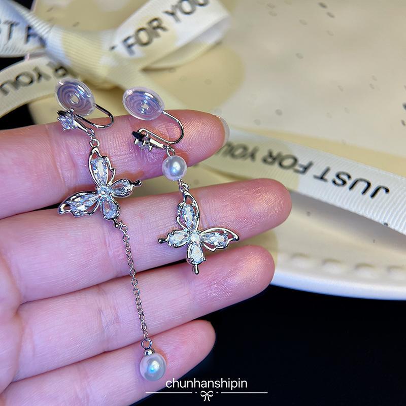 Butterfly zircon fringed pearl earrings without earrings, women's super fairy earclips, light luxury and high-end summer asymmetrical stud earrings