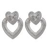 Neue Damenmode Liebe Herzförmige Ohrringe Metall Retro Hohle Doppelherz Ohrringe Schmuck