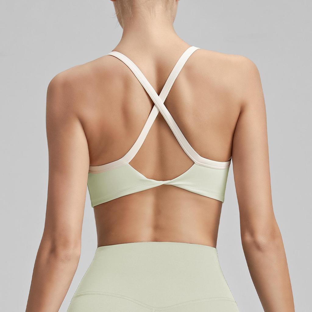 Women's Cross-Back Sports Bra: Sexy, Stylish Design for Pilates, Fitness, and Yoga, with Fixed Cups and Thin Straps for Outdoor Wear.
