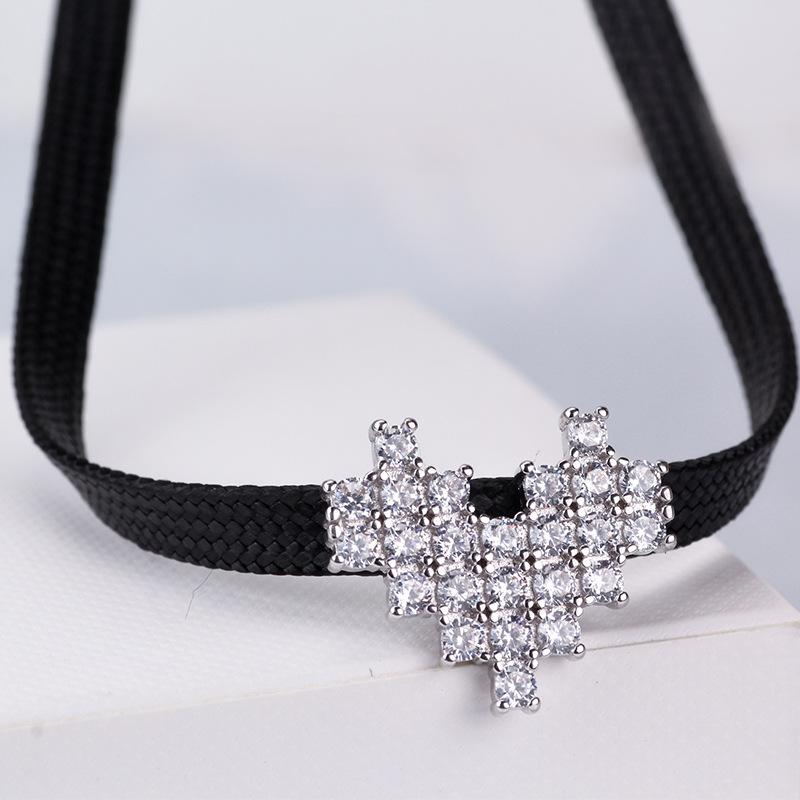 

Beautifully Crafted Heart Choker Necklace For Women With Intricate Crystal Details And Alluring Alloy Material For Event Special
