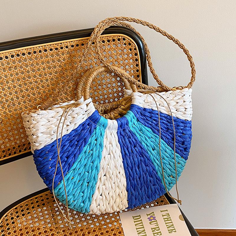 Summer new contrasting color rainbow straw bag portable shoulder oblique span women's bag