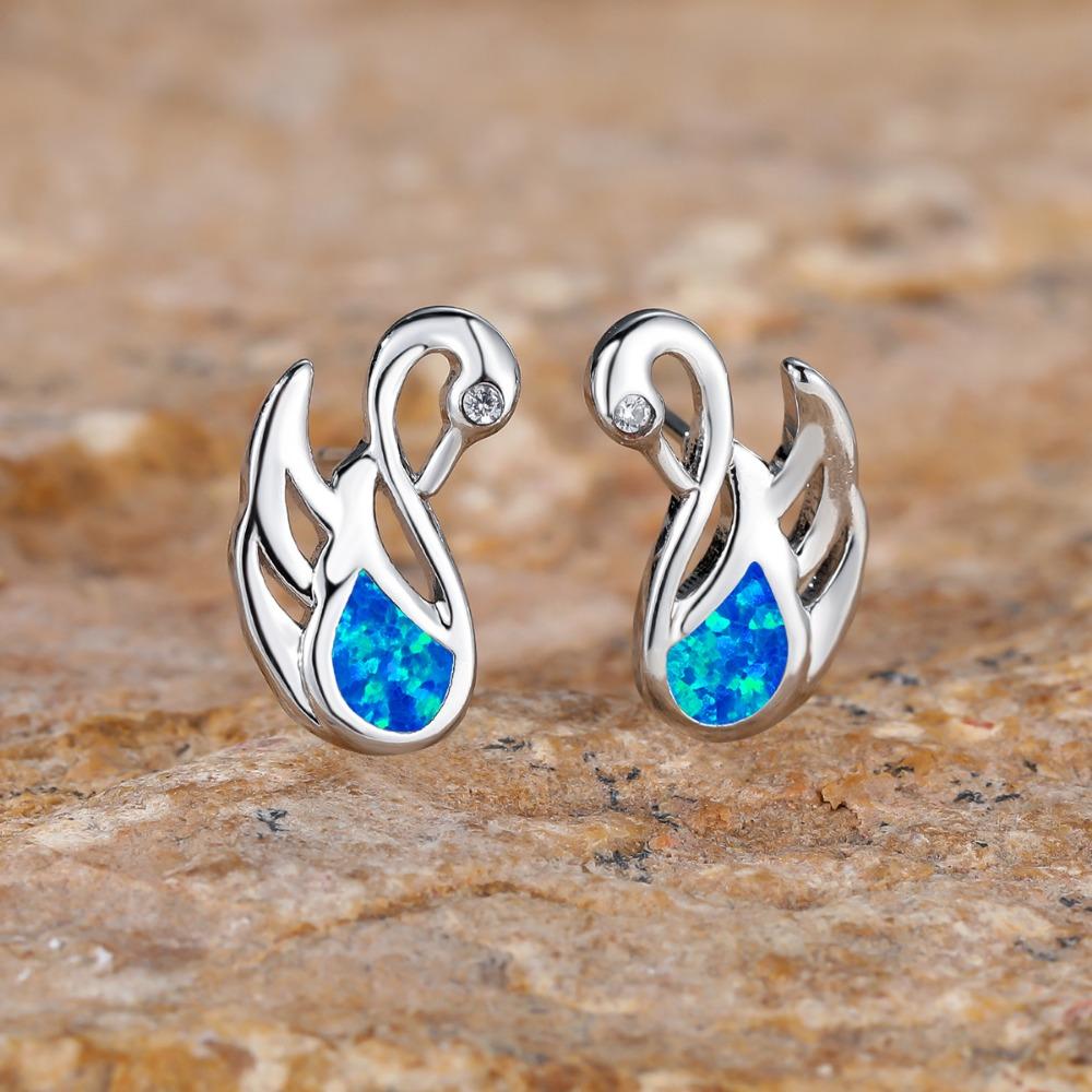 Модные серьги-лебеди с кристаллами циркона — фото 4