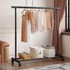 Multifunctional Floor Coat and Clothes Drying Rack for Bedroom, Balcony, or Dorm.