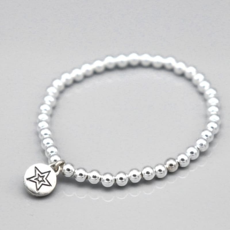 BONBEAU Bransoletka z zawieszką Star smile i srebrną kulką