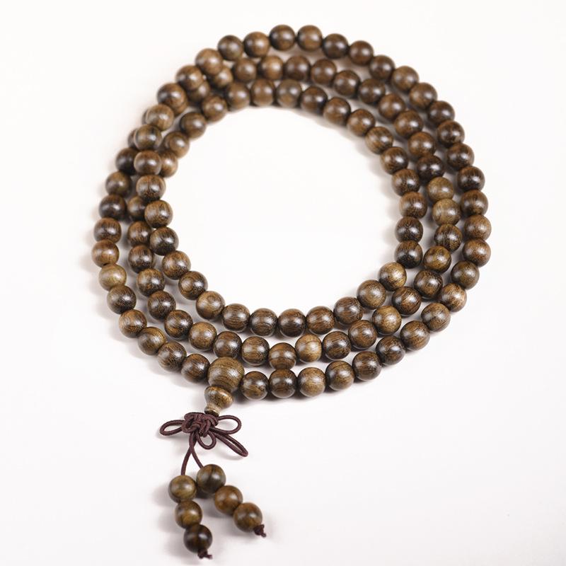 Sichuan Golden Silk Nanmu Ebony Bracelet - Intricate Wenwan Ornament with Perfect Style