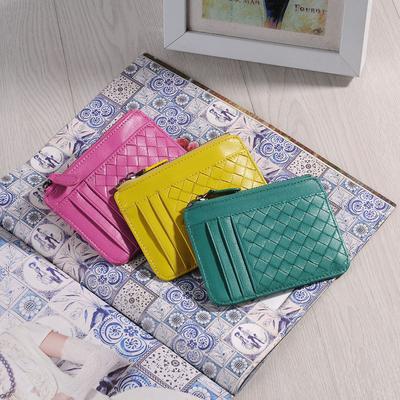 Sac à clés tissé en peau de mouton Sac de ramassage authentique pour homme Porte-monnaie à fermeture éclair pour femme Petit sac portefeuille en cuir exquis et tendance