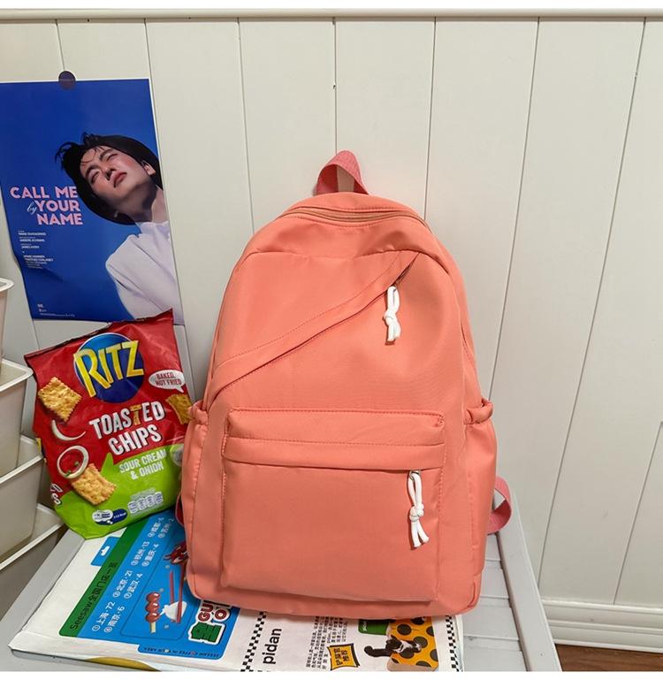 Schoolbag Classic Junior high school schoolbag for women, niche design sense, student backpack for girls, simple casual backpack for men