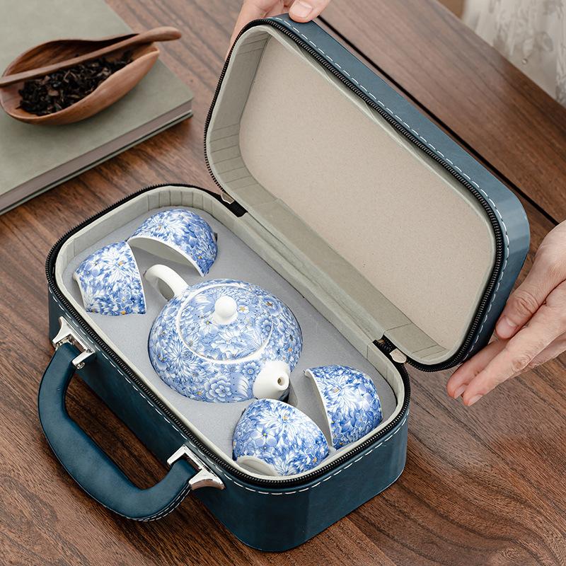 Travel tea set, flowering Ru kiln kung fu, a pot of four cups, portable express cup, outdoor tea maker, souvenir