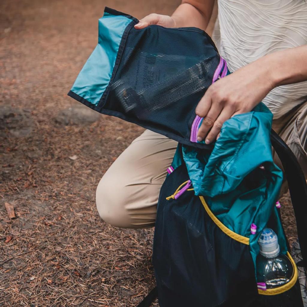 Gossamer Gear Minimalist 19 Daypack in Grey. Ultralight 19L backpack for commuting, hiking, and everyday use. Foldable for compact storage.