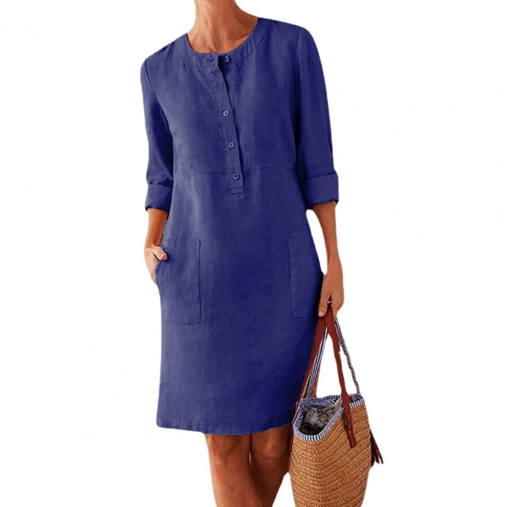 

Елегантна жіноча сукня міді до коліна з круглим вирізом, довгими рукавами та накладною кишенею для повсякденного носіння восени та навесні M темно-синього кольору