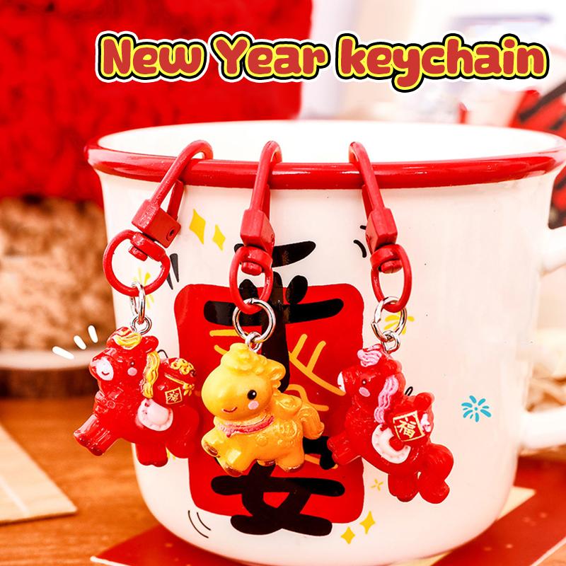 1/7 Stück Cartoon Jahr des Pferdes Schlüsselanhänger Niedlicher Harz-Pony-Schlüsselring Taschendekoration Zubehör Jahresanhänger Kleine Geschenke