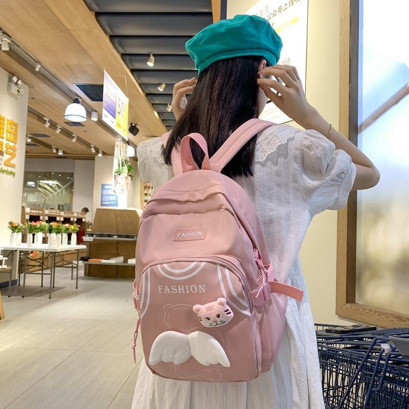 

Fashion kindergarten schoolbag super light cute wings travel large capacity small schoolbag розовый