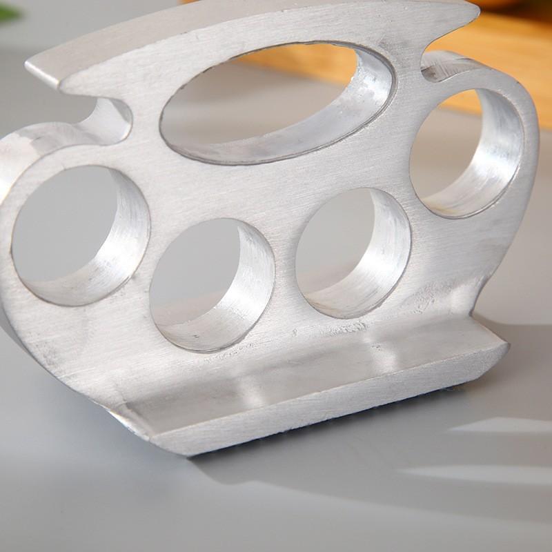 

Мясорубка из нержавеющей стали в форме кастета - Прочный и эффективный кухонный инструмент серебряный