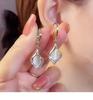 925 Sterling Silver Angel Teardrop Earrings for Women, High-End Niche Light Luxury with Cat's Eye Stone.