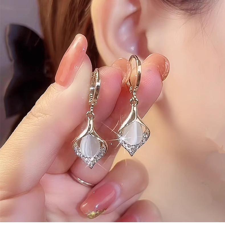 925 Sterling Silver Angel Teardrop Earrings for Women, High-End Niche Light Luxury with Cat's Eye Stone.