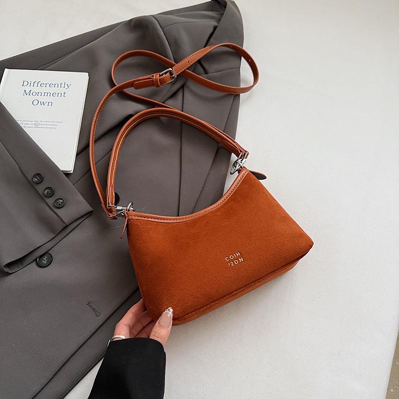 

2025 autumn new fashion trend large-capacity bag casual texture women s bag foreign style shoulder messenger bag коричневий