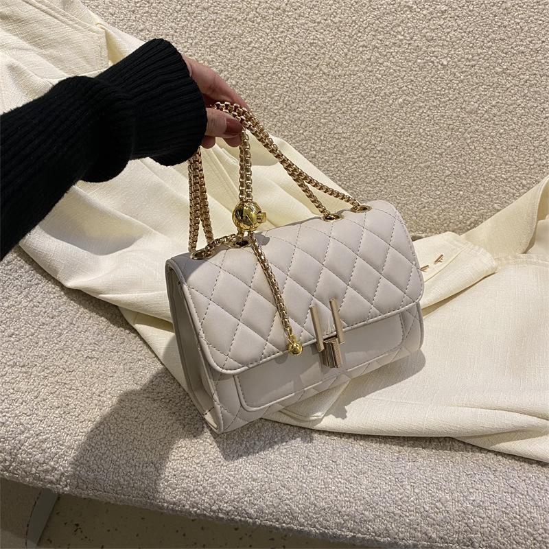 

Весенняя мода 2025 года: Женская маленькая квадратная сумка-цепочка с замком-кисточкой для повседневных поездок грязно-белый