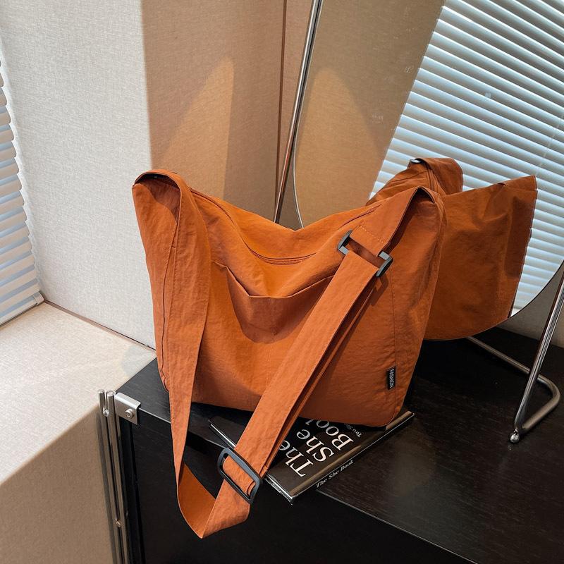 

Large-capacity commuter tote bag spring and summer new versatile canvas bag female college student messenger bag tide помаранчевий