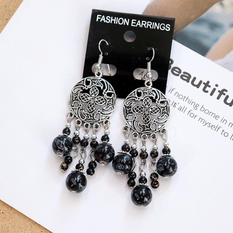 Retro Elegant Hollow Long Fringed Earrings Women's Simple Temperament Versatile Earrings Personalized Earrings