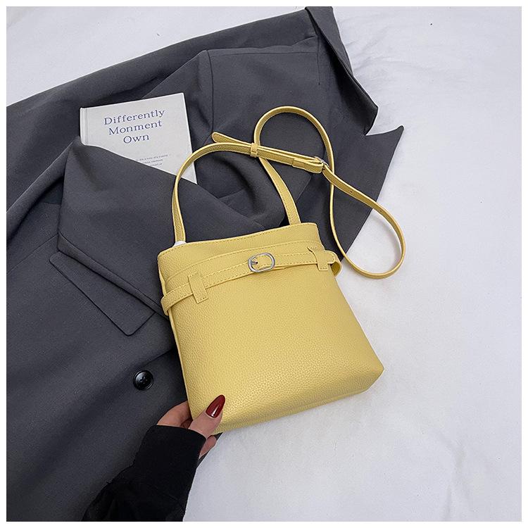 Versatile commuter lychee pattern bucket bag women's spring summer new commuter shoulder messenger mobile phone bag tide