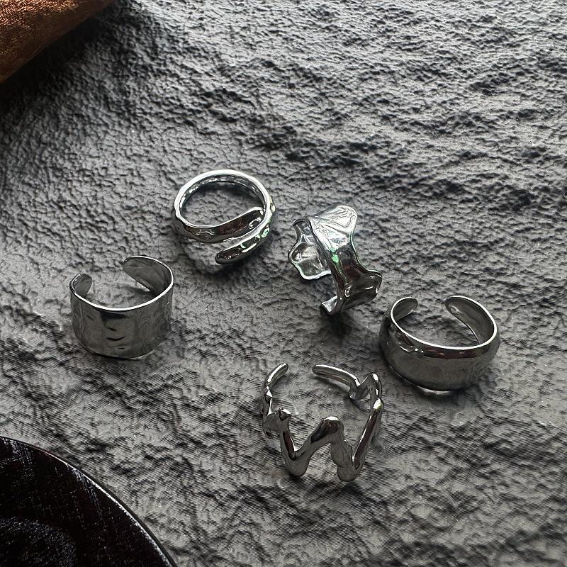 European & American Retro Rock Lava Ring: Hammered Texture, INS Style, Stainless Steel, Trendy Wide Band, Adjustable for Men.