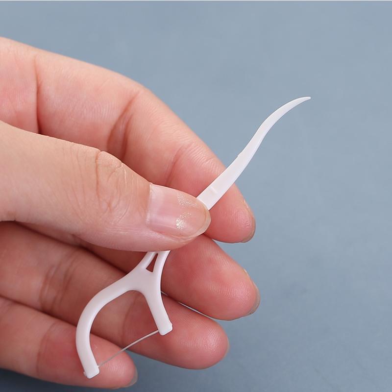 50 szt. Nić dentystyczna Flosser Picks Wykałaczki Patyczki do zębów Czyszczenie zębów Szczoteczka międzyzębowa Wykałaczka z nicią dentystyczną Pielęgnacja higieny jamy ustnej