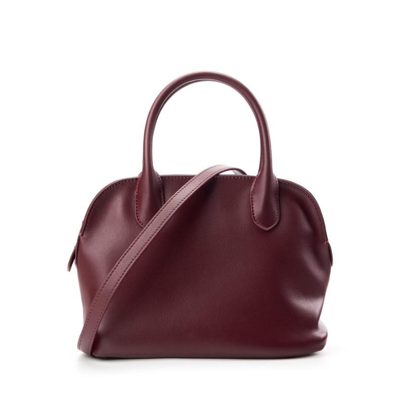 

Простая высококлассная сумка-боулинг для通勤, нишевый дизайн, кожаная женская сумка-ракушка