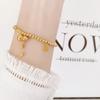New Style Light Luxury Red Rope Titanium Steel Bracelet with Gold Coin for Women - Wealth Attraction and Festive Elegance by Xiyin