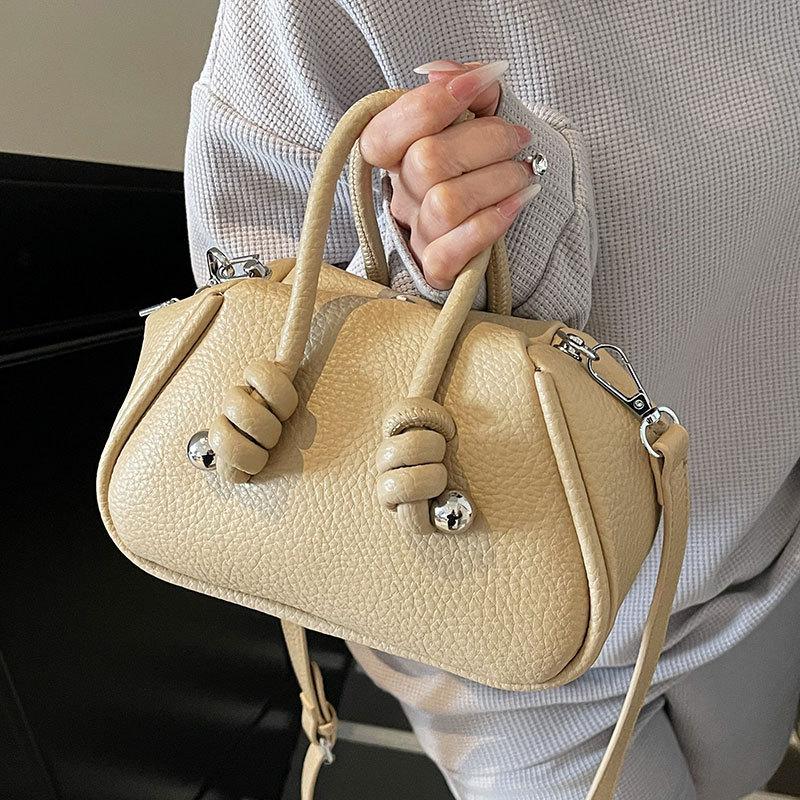 Trendy new product simple solid color niche design handbag bag femininity versatile high sense lychee pattern messenger bag