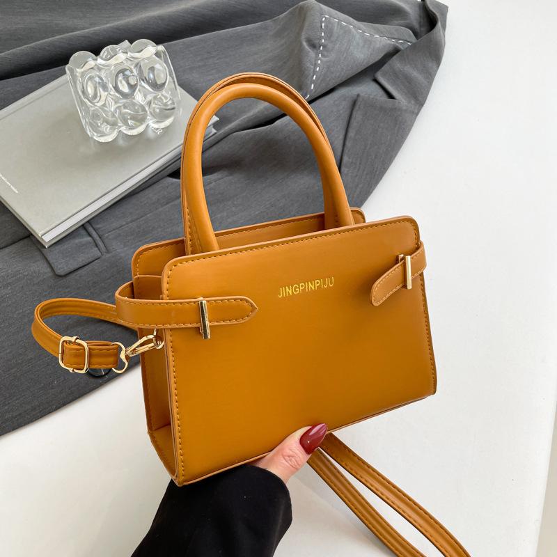 Modische Pendler-Handtasche Damen neue einfache temperamentvolle kleine quadratische Tasche vielseitige Einzel-Schulter-Umhängetasche Damen-Tasche
