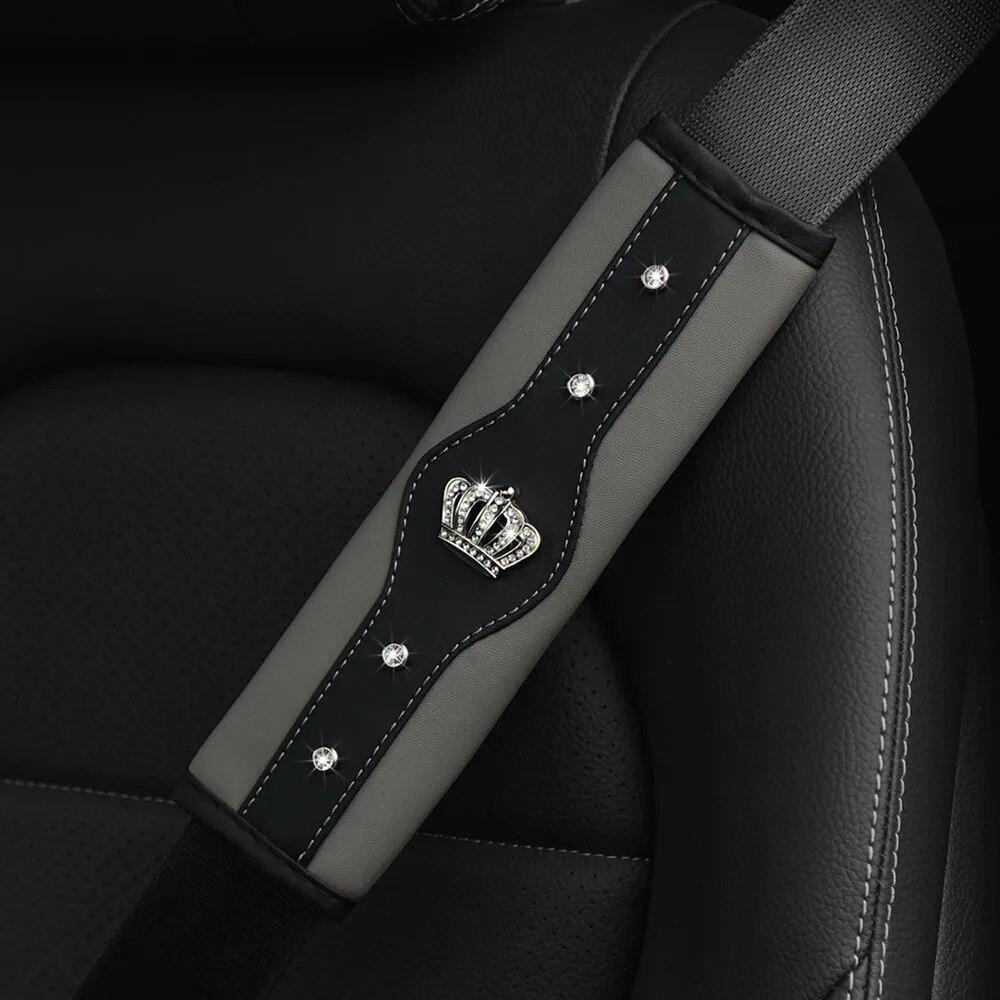 A Stereo Leather Car Seat Belt Shoulder Protector with a Rhinestone Crown and a Car Accessory with an Insurance Belt Cover