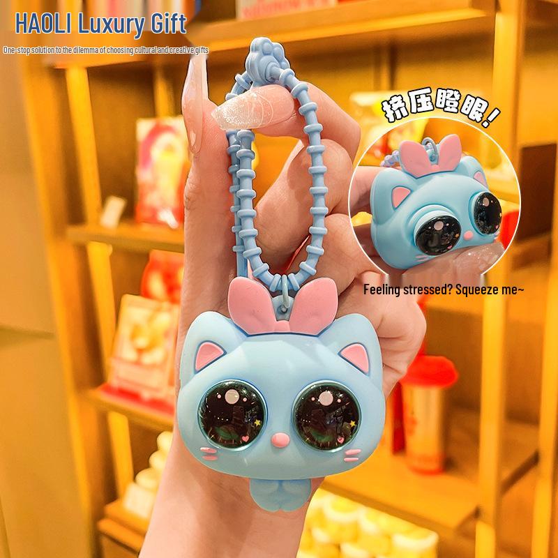 2026 Pop-Out Eye Cat Squeeze Toy Keychain: Cute Cartoon Stress Relief Pendant for Backpacks