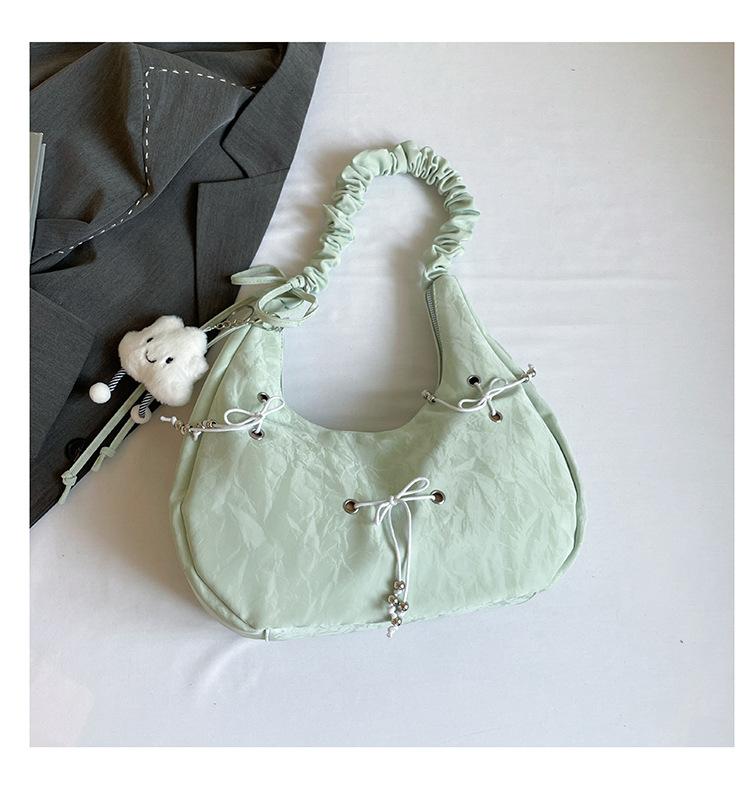 

Niche personalized lace-up large-capacity commuting 2025 foreign casual armpit bag new fashionable and beautiful shoulder bag зелёный