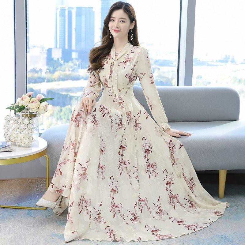 Spring and summer women's new long dress, jacquard chiffon super fairy waist beach pendulum bow super long dress