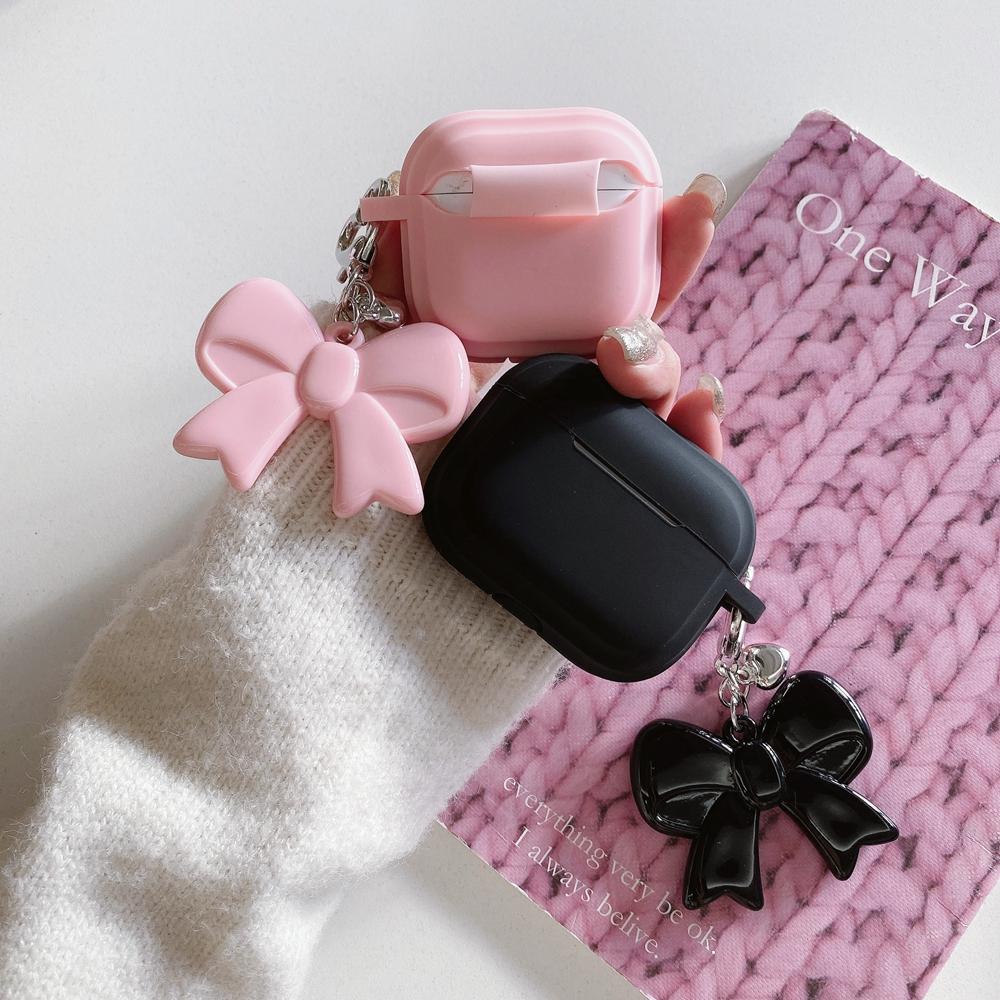 Schutzhülle aus weichem Silikon mit Schleifenanhänger für AirPods 1, 2, 3 und 4 sowie Apple AirPods Pro 2 – ein ideales Geschenk für Frauen und Mädchen.