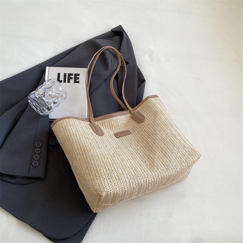 Woven straw bag women's large capacity 2025 new summer versatile shoulder bag texture class commuter tote bag