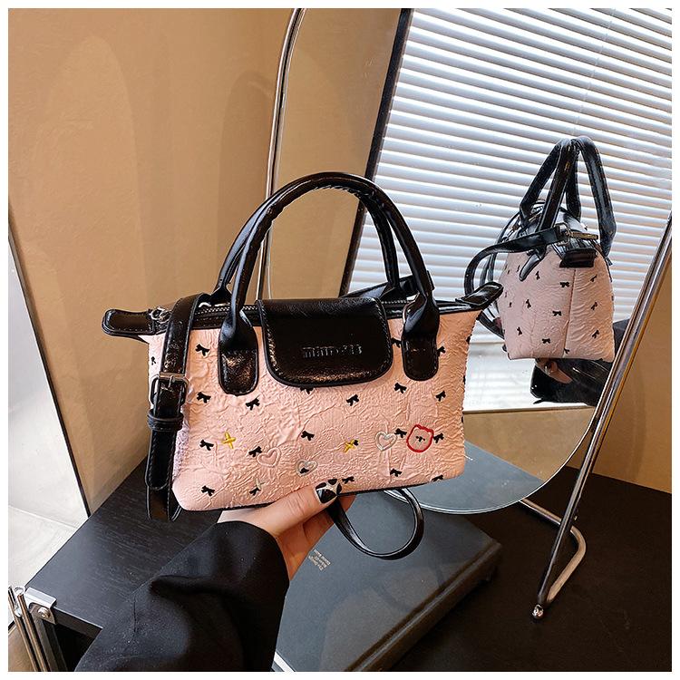 

High-end niche bag women s summer new fashion messenger bag portable small bag рожевий