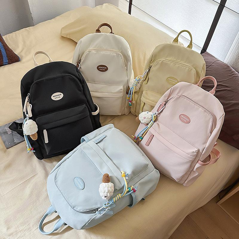 Backpack women 2025 new fashion and leisure junior high school students travel backpack simple versatile college bag tide