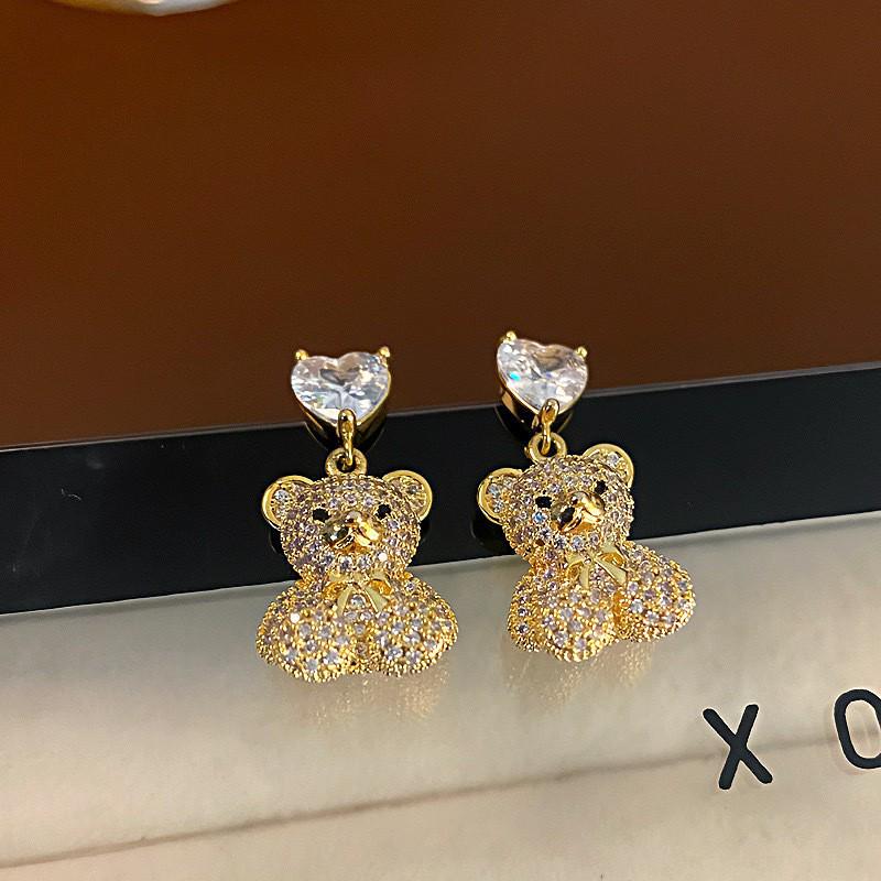 Серьги-лебеди из серебра 925 пробы с цирконием — элегантные, модные и универсальные