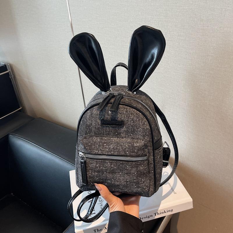 

Denim backpack women s casual niche design cartoon student class schoolbag cute high-value backpack чорний