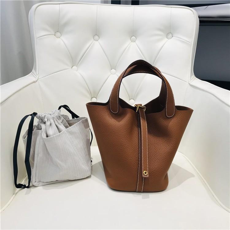 

Нова жіноча сумка з натуральної шкіри першого шару, візерунок «лічі», золота пряжка, сумка-відро в стилі кошика, модна та проста повсякденна сумка 18cm