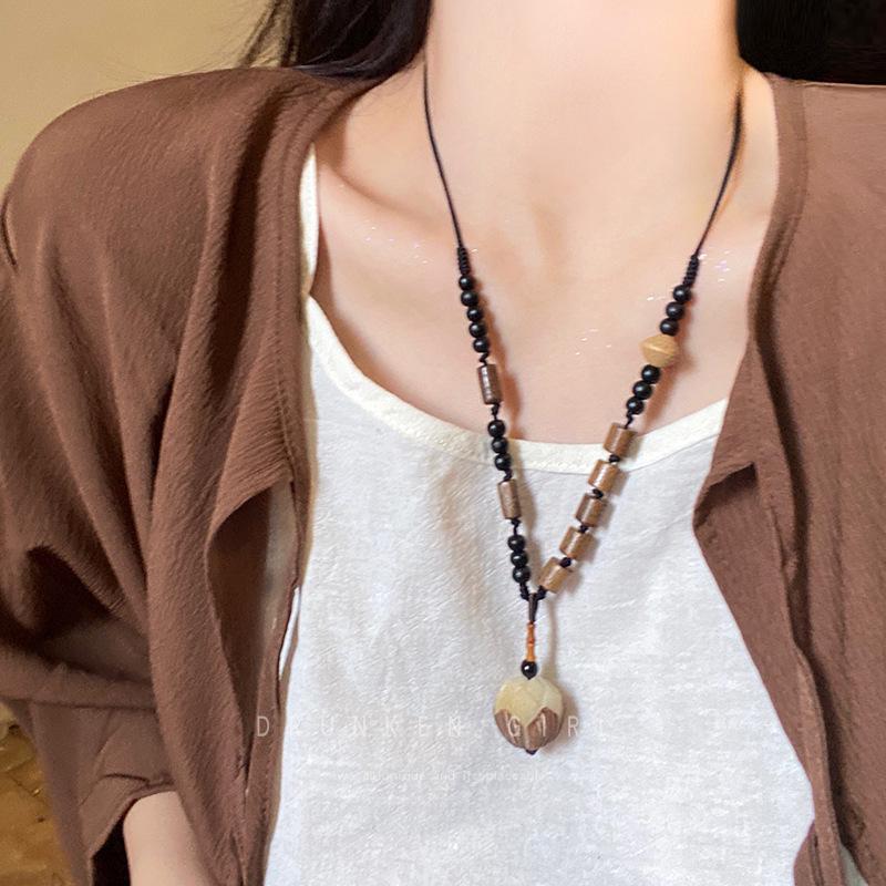 Elegant Stacked Pearl Necklace for Women - High-End Autumn/Winter Accessory with a Stylish Sweater Chain Design