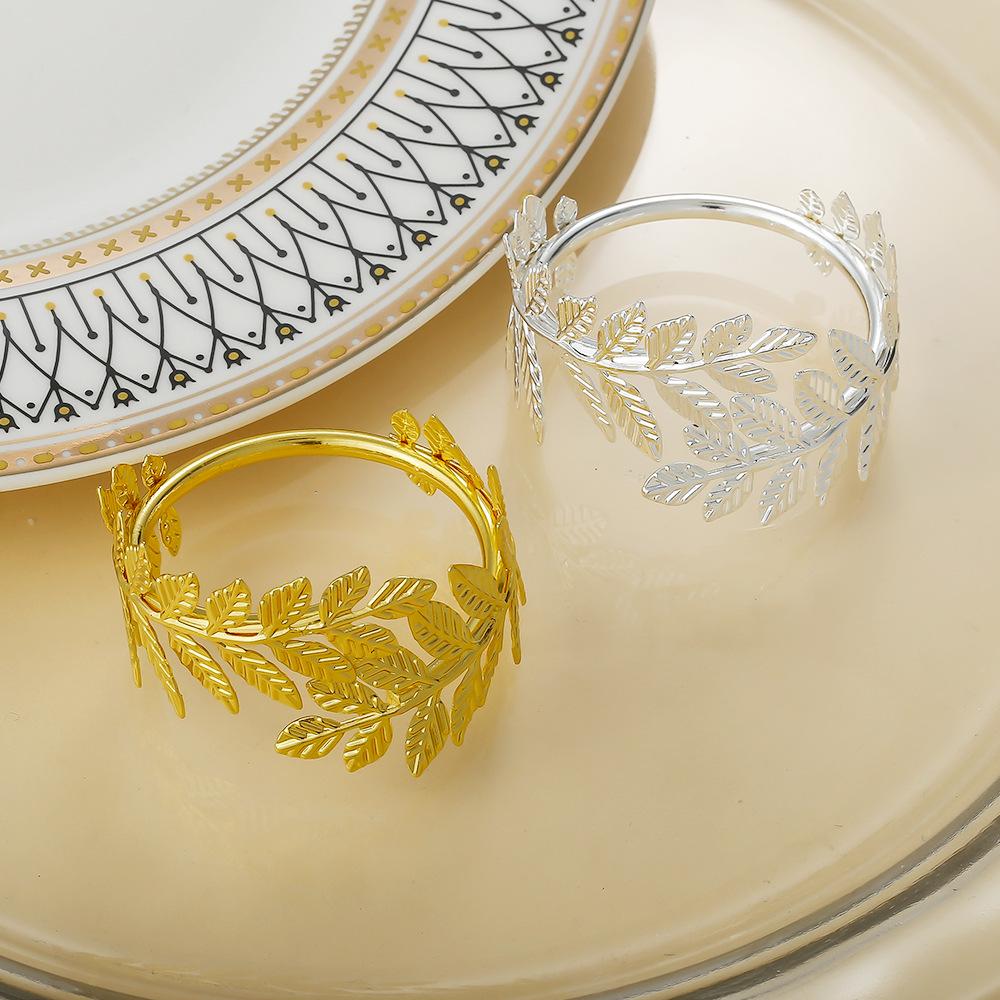 12 ks/lot Nový zlatý simulovaný list kroužek na ubrousky hotelový otevřený kovový držák na ubrousky jednoduchý list kroužek na ubrousky kroužek na ústní utěrku