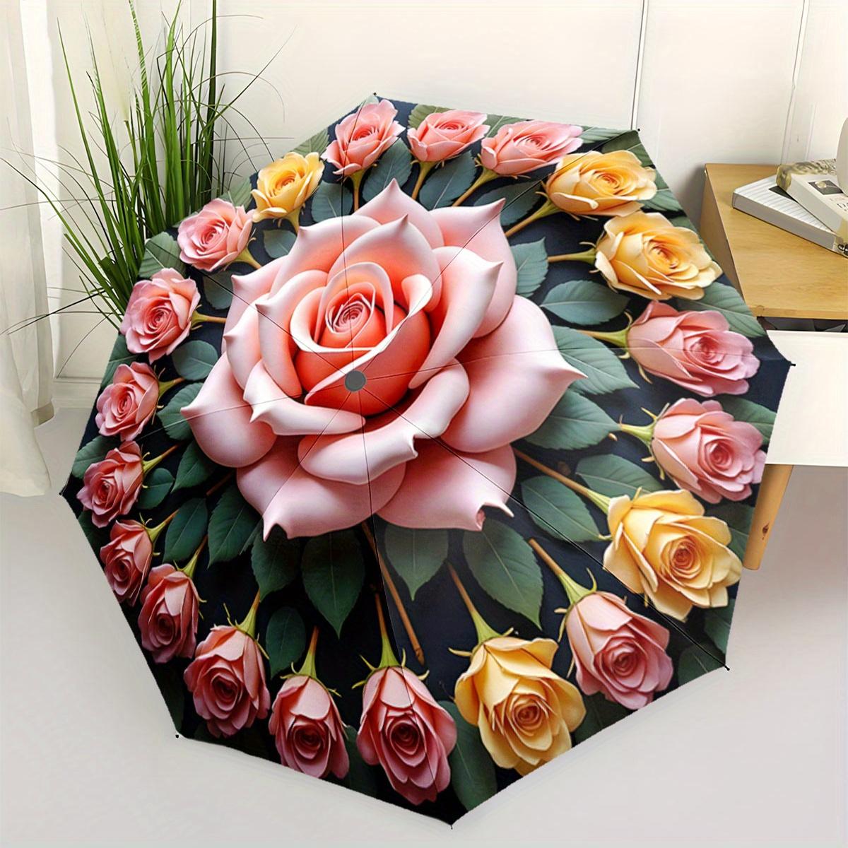 A Compact Folding Umbrella Featuring a Large Central Rose with Smaller Roses Around It. It S a Convenient Outdoor Accessory Su