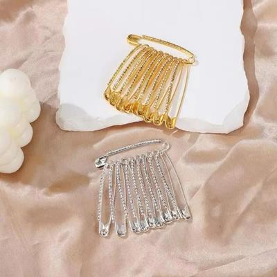 Broches et bijoux de corps